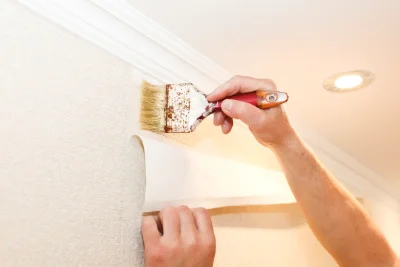 Pose de papier peint à Ens — revêtements muraux et toiles de verre